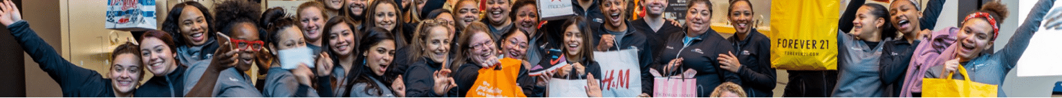 Panorama of CT Braces team posing in a large group photo with their new drip from the mall