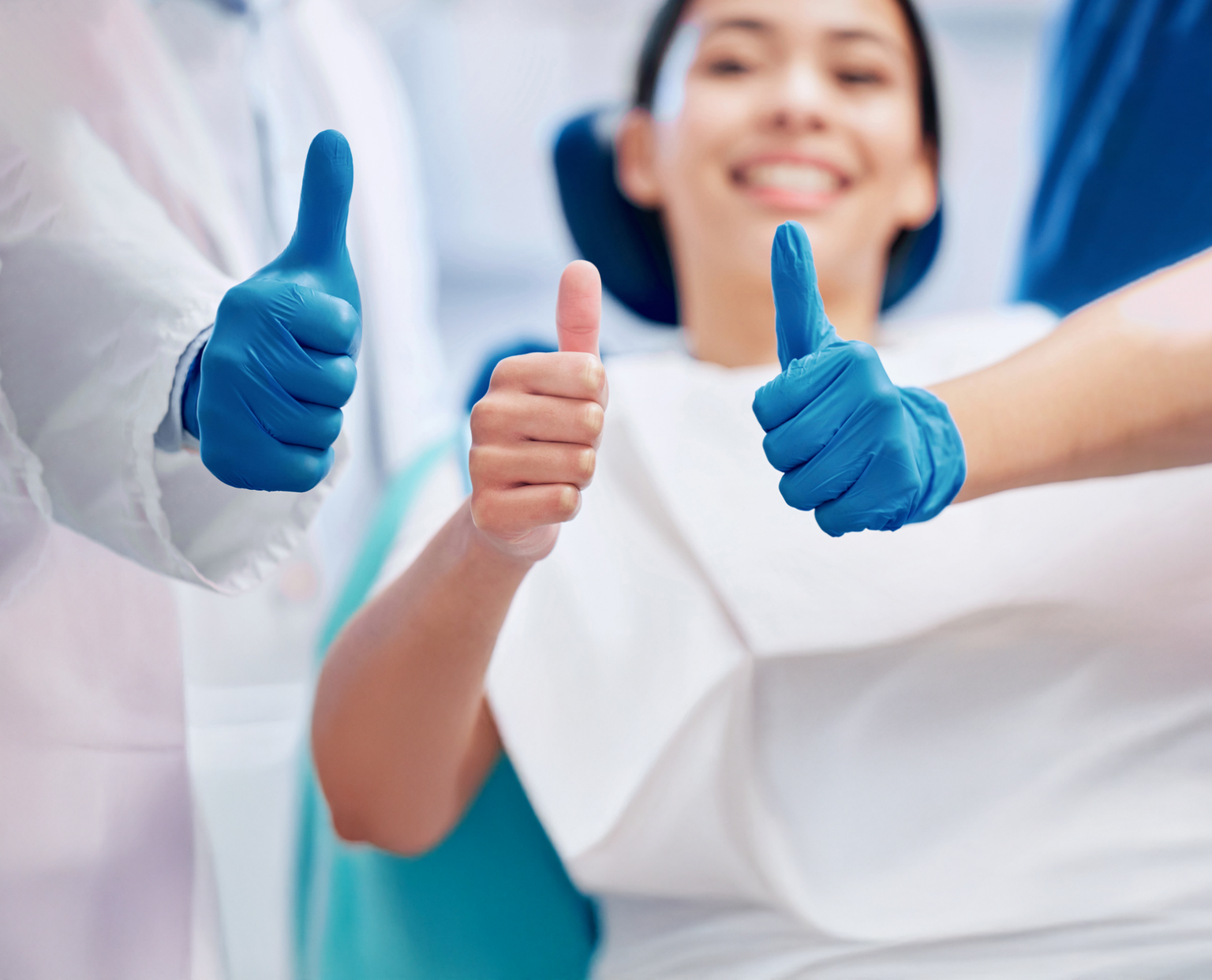 Tween receiving early orthodontic treatment with cerulean braces