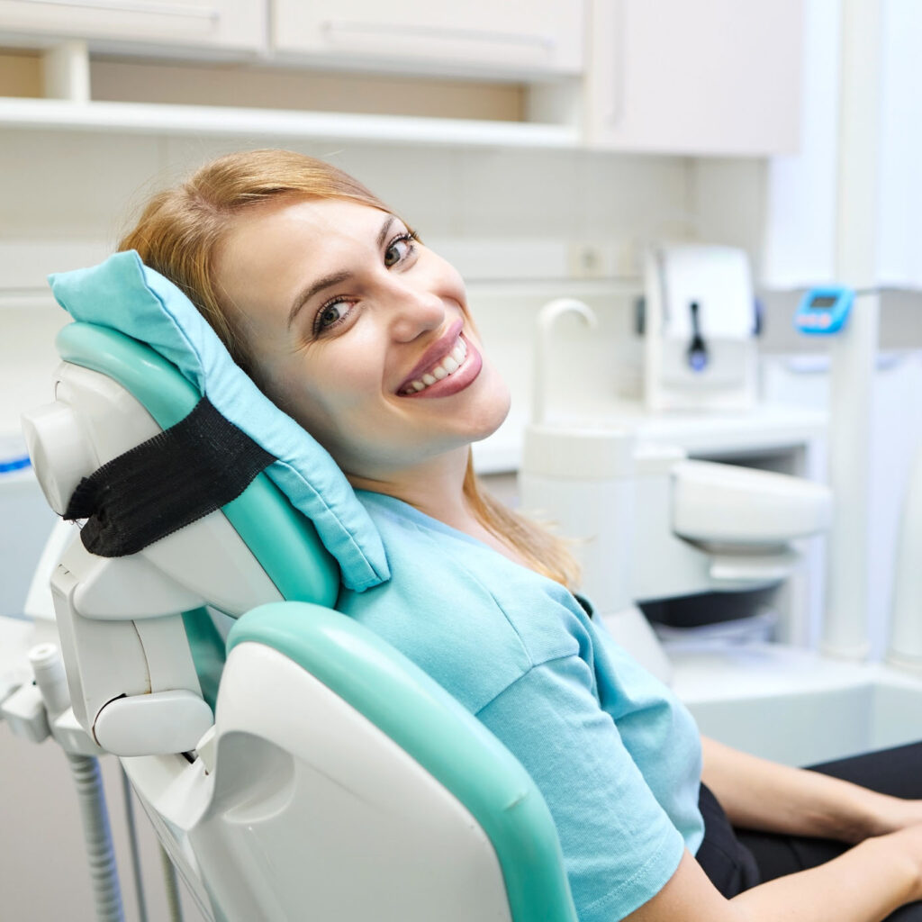 Smiling patient in chair